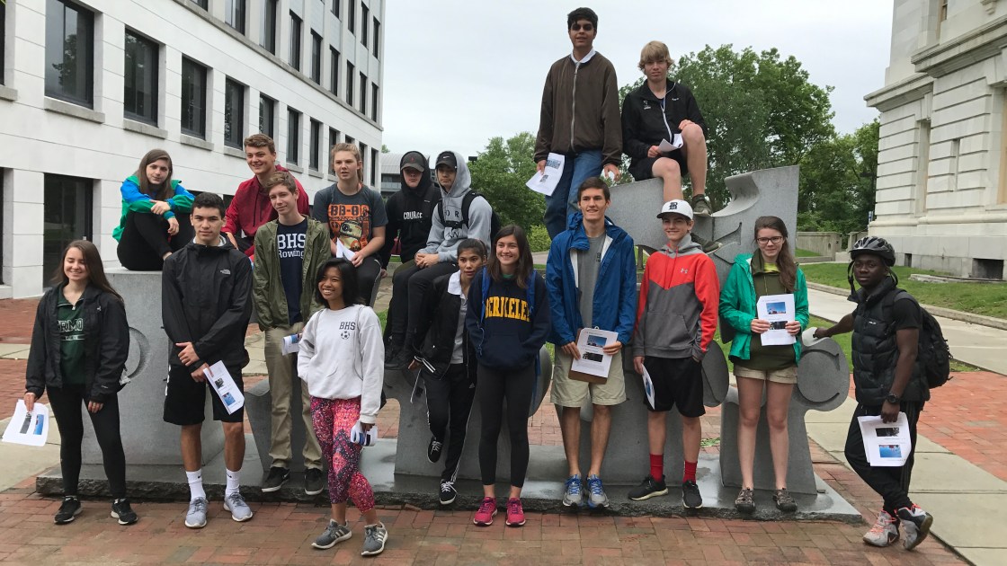 Students in front of "Democracy" sculpture in downtown Burlington