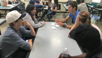 Students in deep discussion