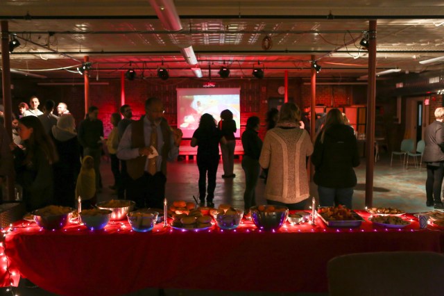 Event space with food, lightning, and people