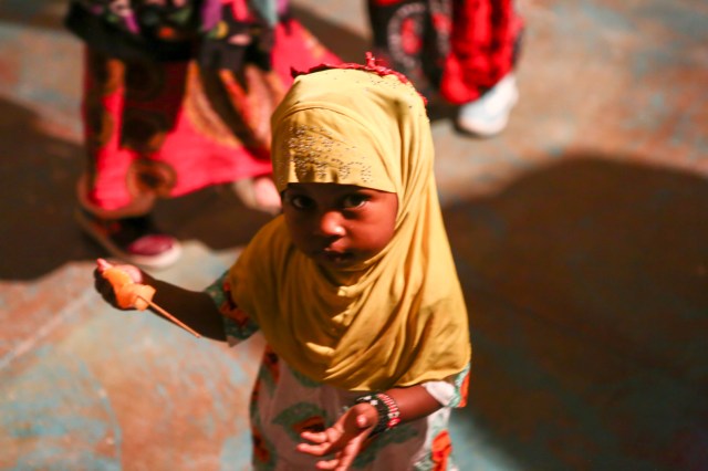 Young girl with fruit