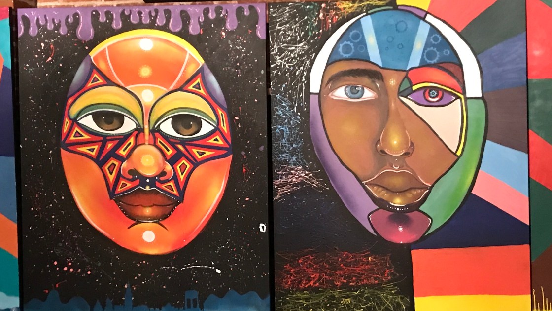Four paintings of faces