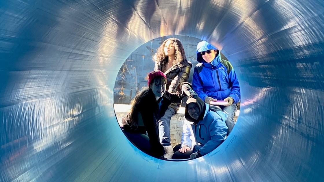 A portrait of students at the public works event