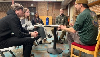 Neil Preston talks with students